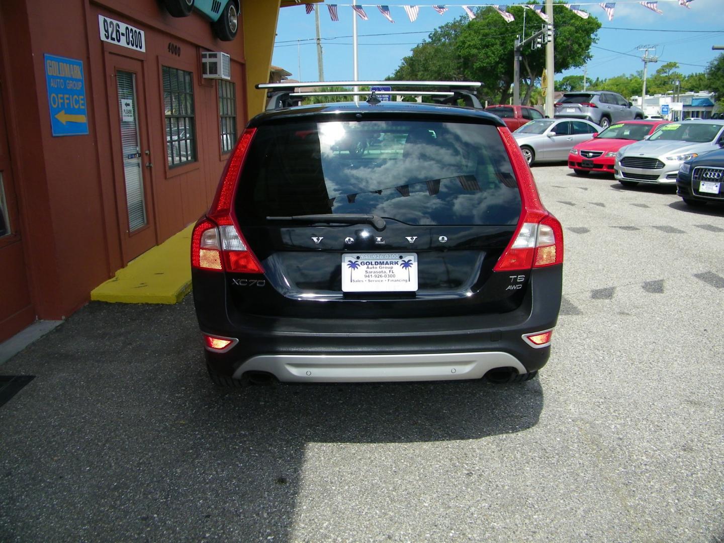 2011 Black /Beige Volvo XC70 T6 AWD (YV4902BZ9B1) with an 3.2L L6 DOHC 24V engine, 6-Speed Automatic transmission, located at 4000 Bee Ridge Road, Sarasota, FL, 34233, (941) 926-0300, 27.298664, -82.489151 - Photo#2